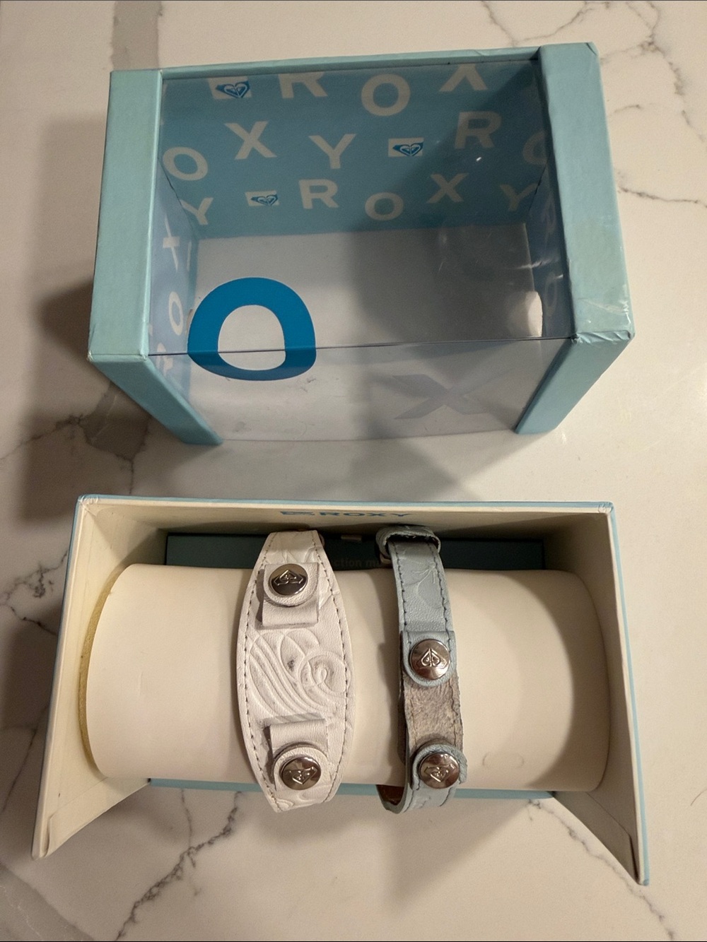 Roxy White and Light Blue Snap Bracelet watch bands. Watch not included.